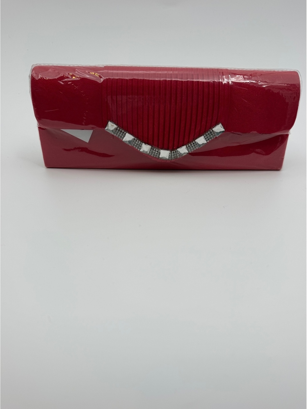 Red clutch purse with silver tone accent